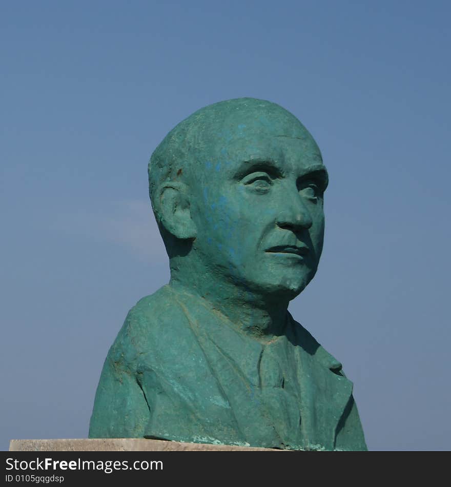 Green statue of a man