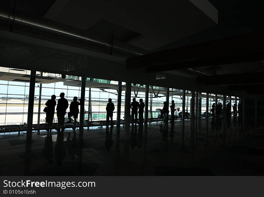 People waiting in the airport. People waiting in the airport