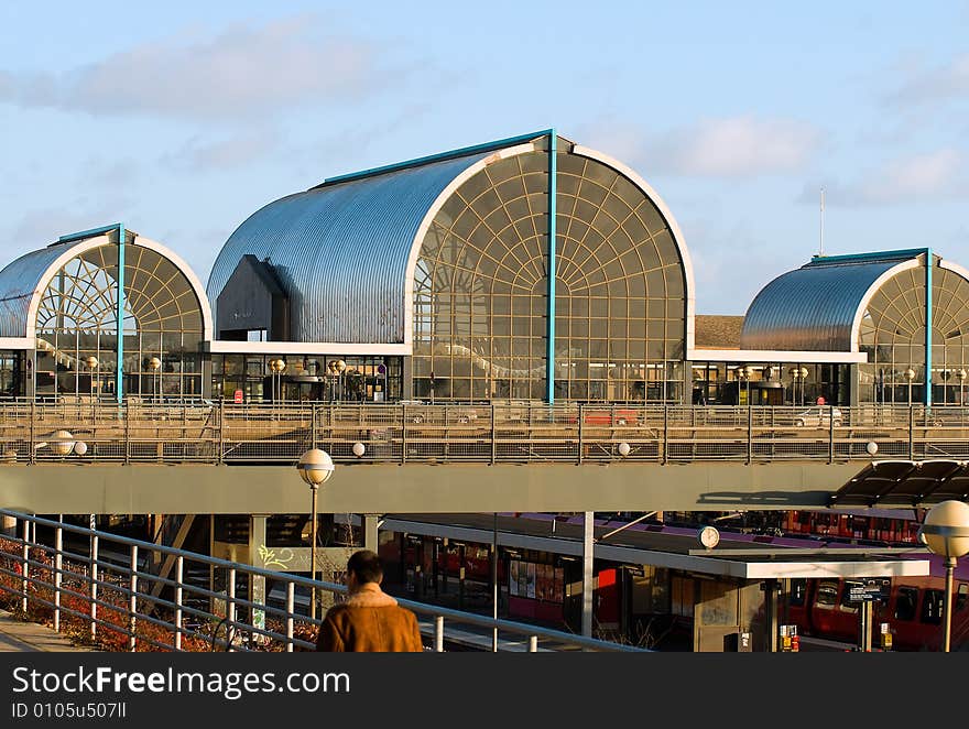 This is a trainstation in glass and steel