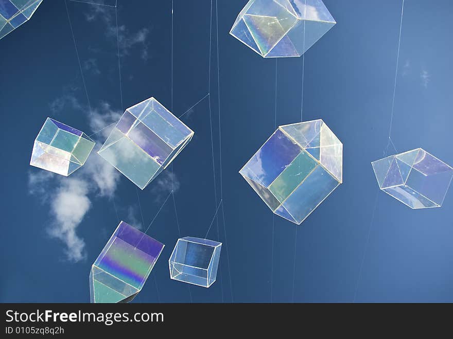 Installation art piece with floating perspex houses suspended on wire to look like polygonal soap bubbles. Installation art piece with floating perspex houses suspended on wire to look like polygonal soap bubbles