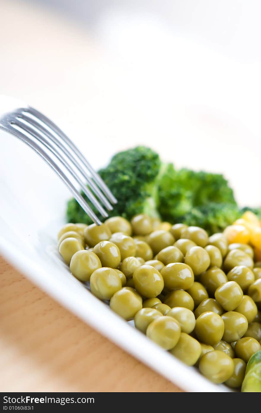 Fresh vegetables in white dish close up