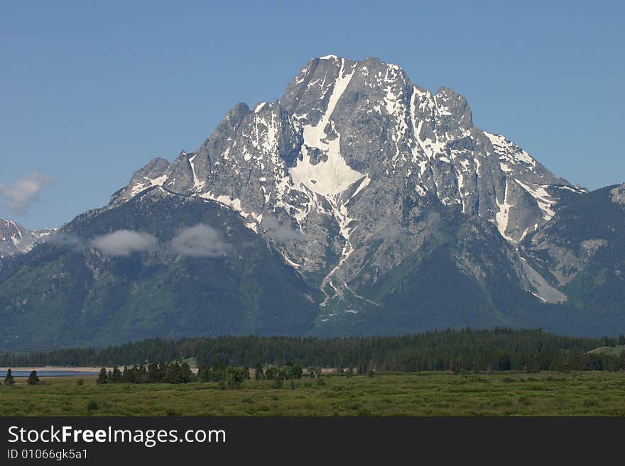 A panaromic view of the Grand Teton Mountains in Grand Teton National Park. A panaromic view of the Grand Teton Mountains in Grand Teton National Park.