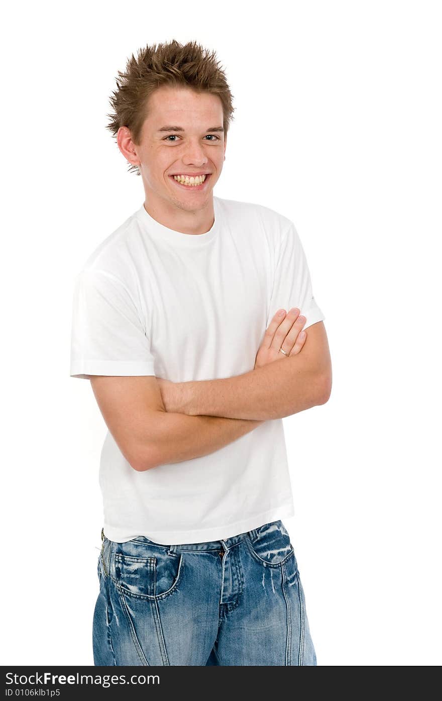 A handsome young man posing in the studio. A handsome young man posing in the studio