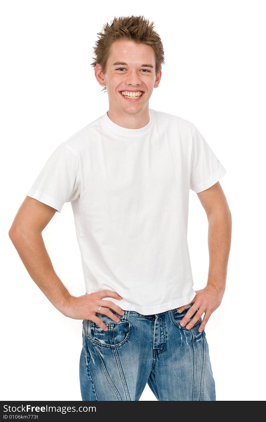 A handsome young man posing in the studio. A handsome young man posing in the studio