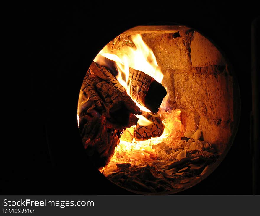 Burning fire in old stove. Burning fire in old stove