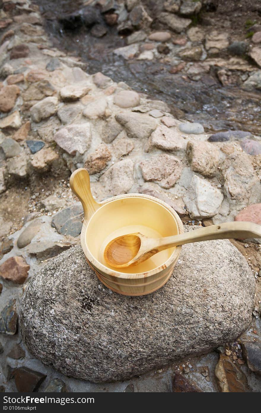 Wooden vat with wooden spoon