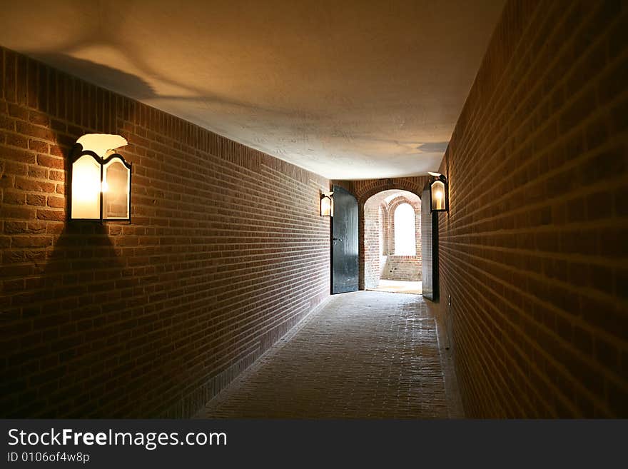 Old stone tunnel under baroque palace. Old stone tunnel under baroque palace