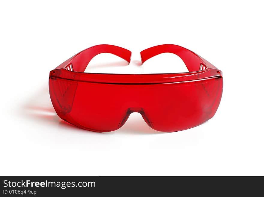 Red goggles on a white background. Red goggles on a white background