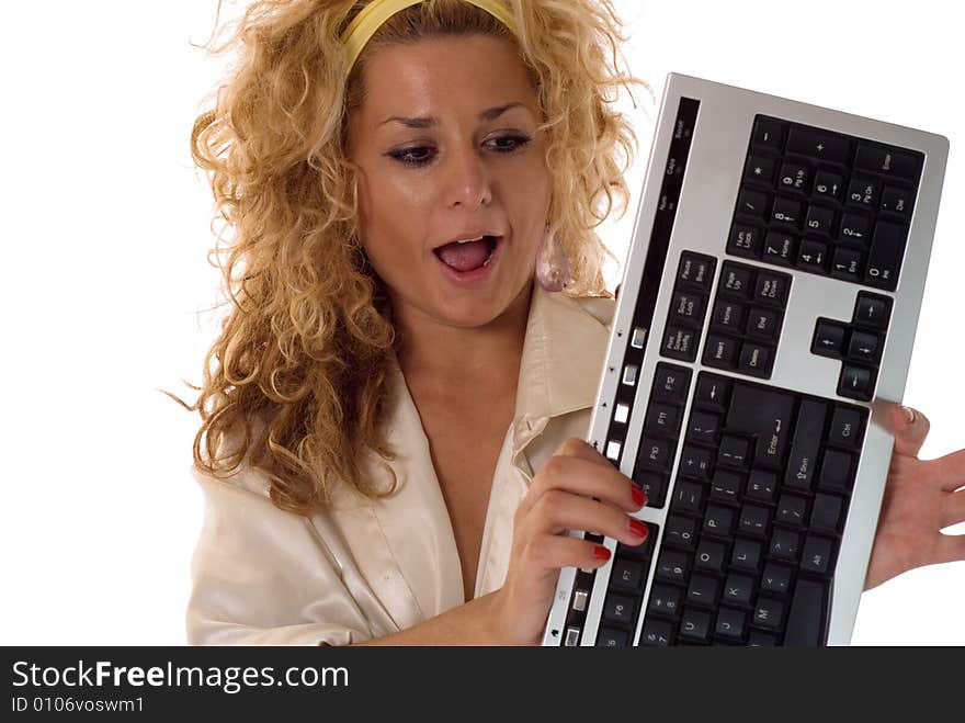 Blonde girl with curly hair holding computers's keyboard