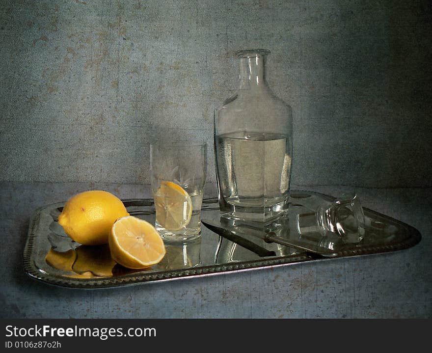 Salver with water and lemons. Salver with water and lemons