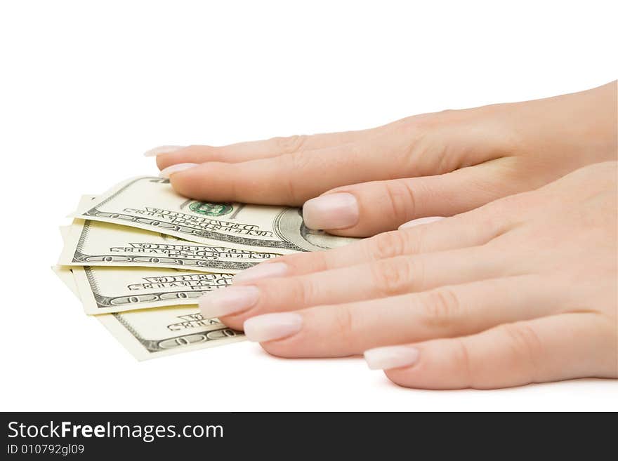 Us dollars banknotes with female hands on them, isolated, with clipping path. Us dollars banknotes with female hands on them, isolated, with clipping path