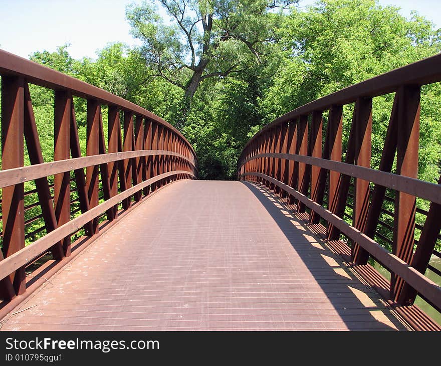 A rusty bridge with a nice curve.