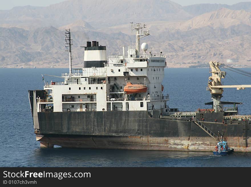 Cargo ship taking pilot on board Aqaba Jordan. Cargo ship taking pilot on board Aqaba Jordan