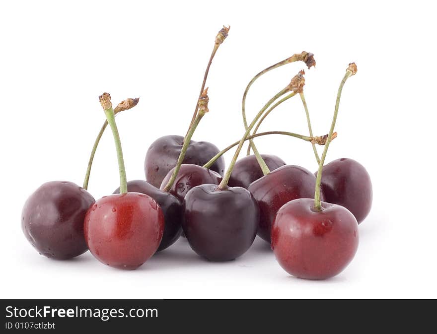 Red cherries on white background