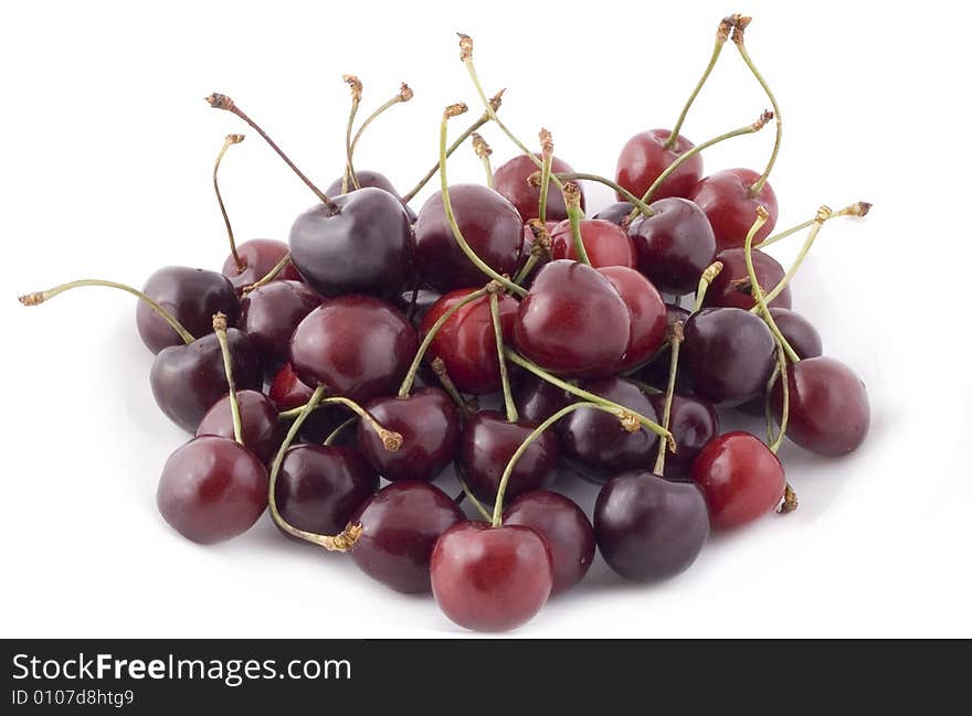 Red cherries on white background