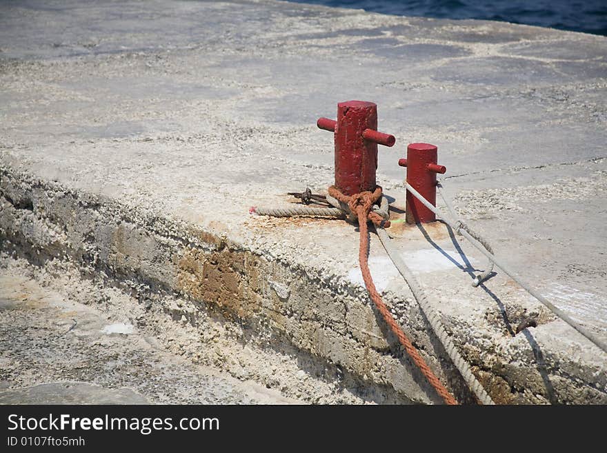 Detail of harbor with water and chain