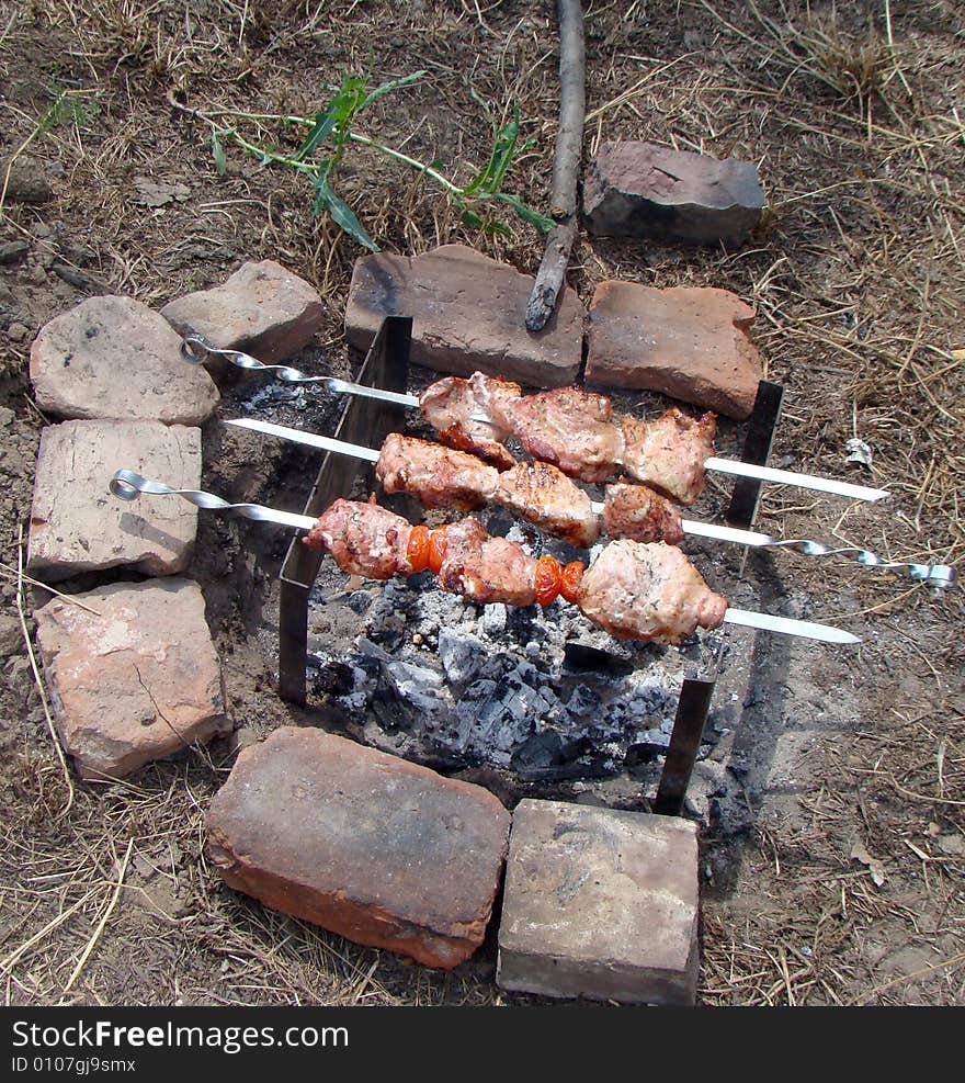 Preparation of shashlik on mangal