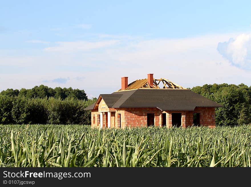 Construction site of a new house at corn field