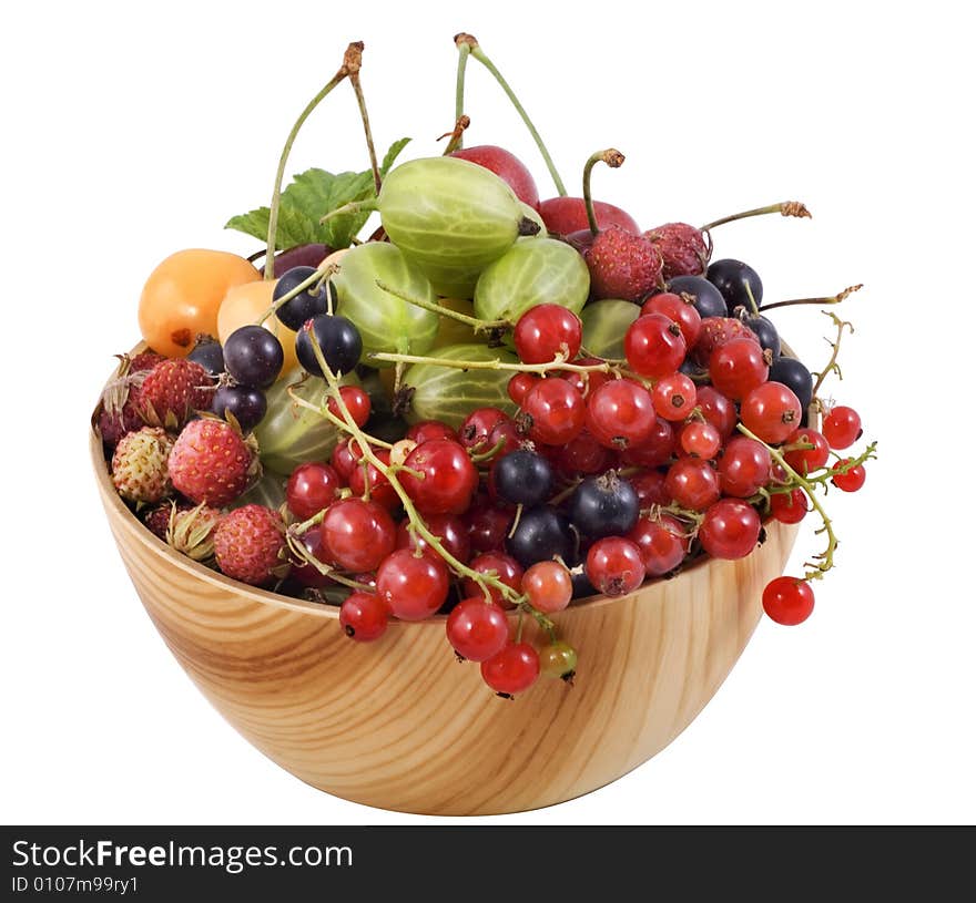 Mixed berries in wooden bowl.