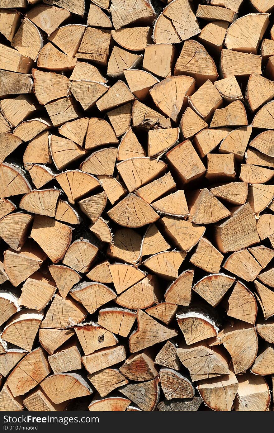 The heap of birchen logs as background. The heap of birchen logs as background