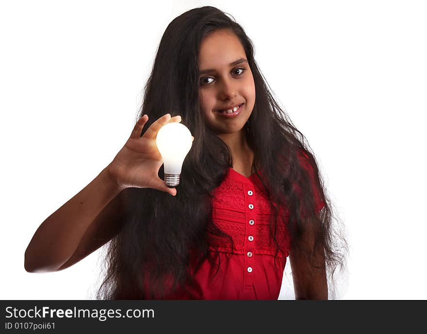 11 year old girl holding a light bulb. 11 year old girl holding a light bulb