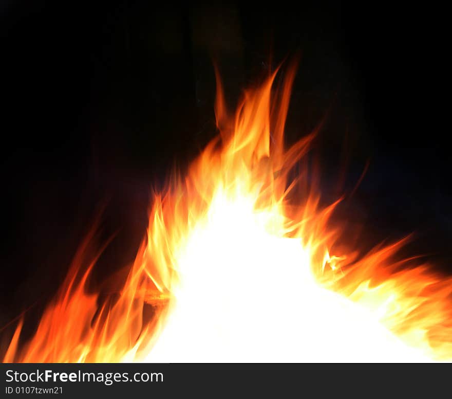 Background with bright yellow fire. Background with bright yellow fire