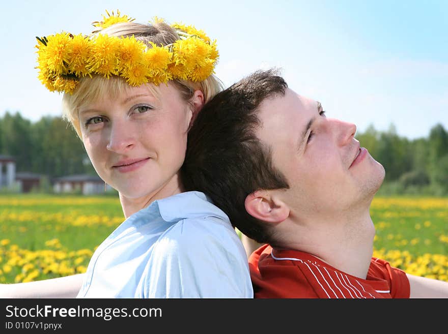 Happy young couple relaxing outdoors. Happy young couple relaxing outdoors