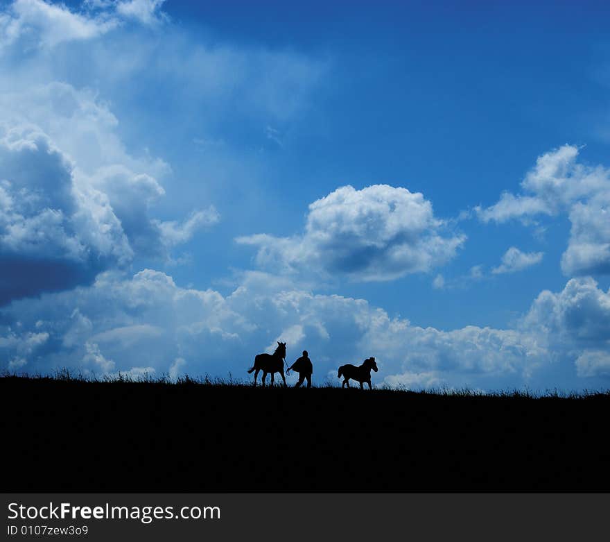 Runaway horses and farmer on big clouds background