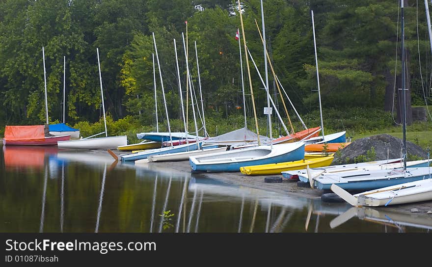 A bunch of boat coasted on the sand. A bunch of boat coasted on the sand