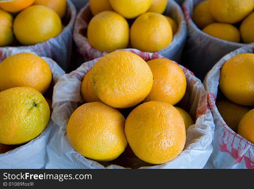 Bushels of juicy oranges