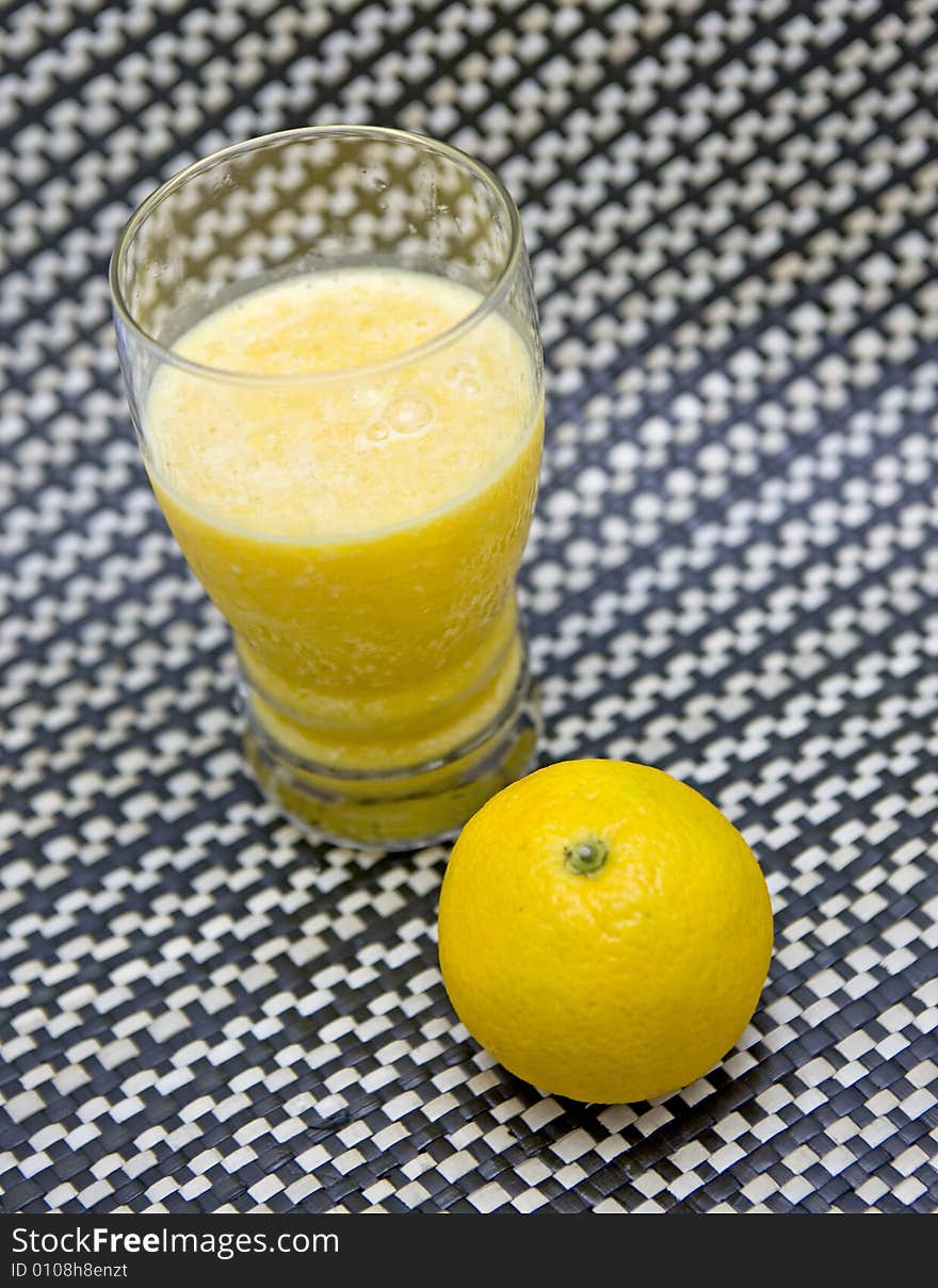 Artistic display of freshly squeezed orange juice. Artistic display of freshly squeezed orange juice.