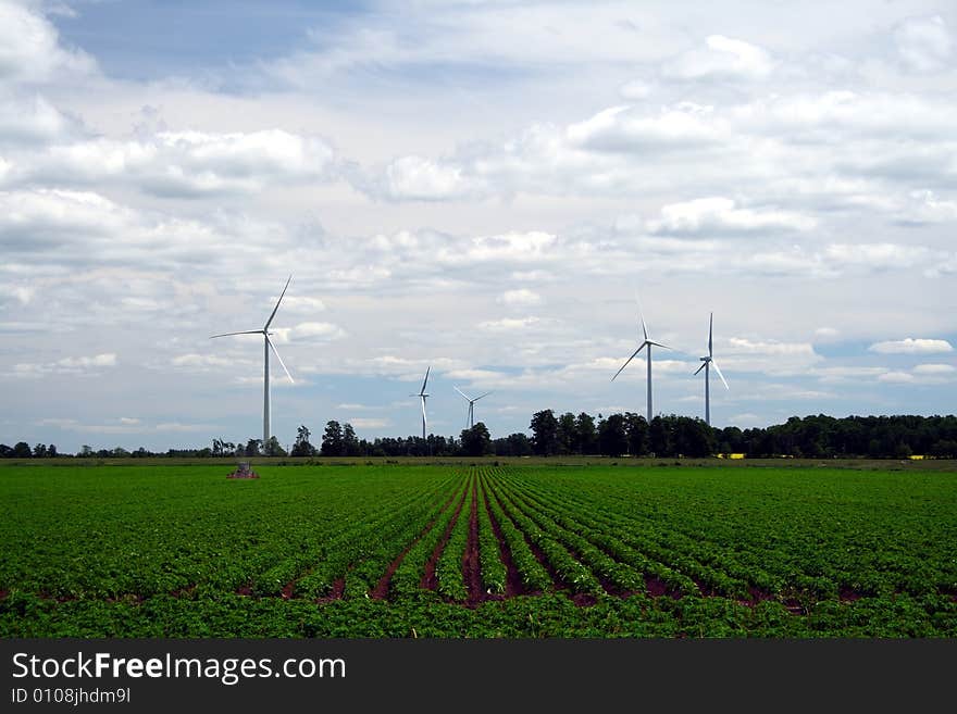 Several wind energy turbines on a farm. Several wind energy turbines on a farm