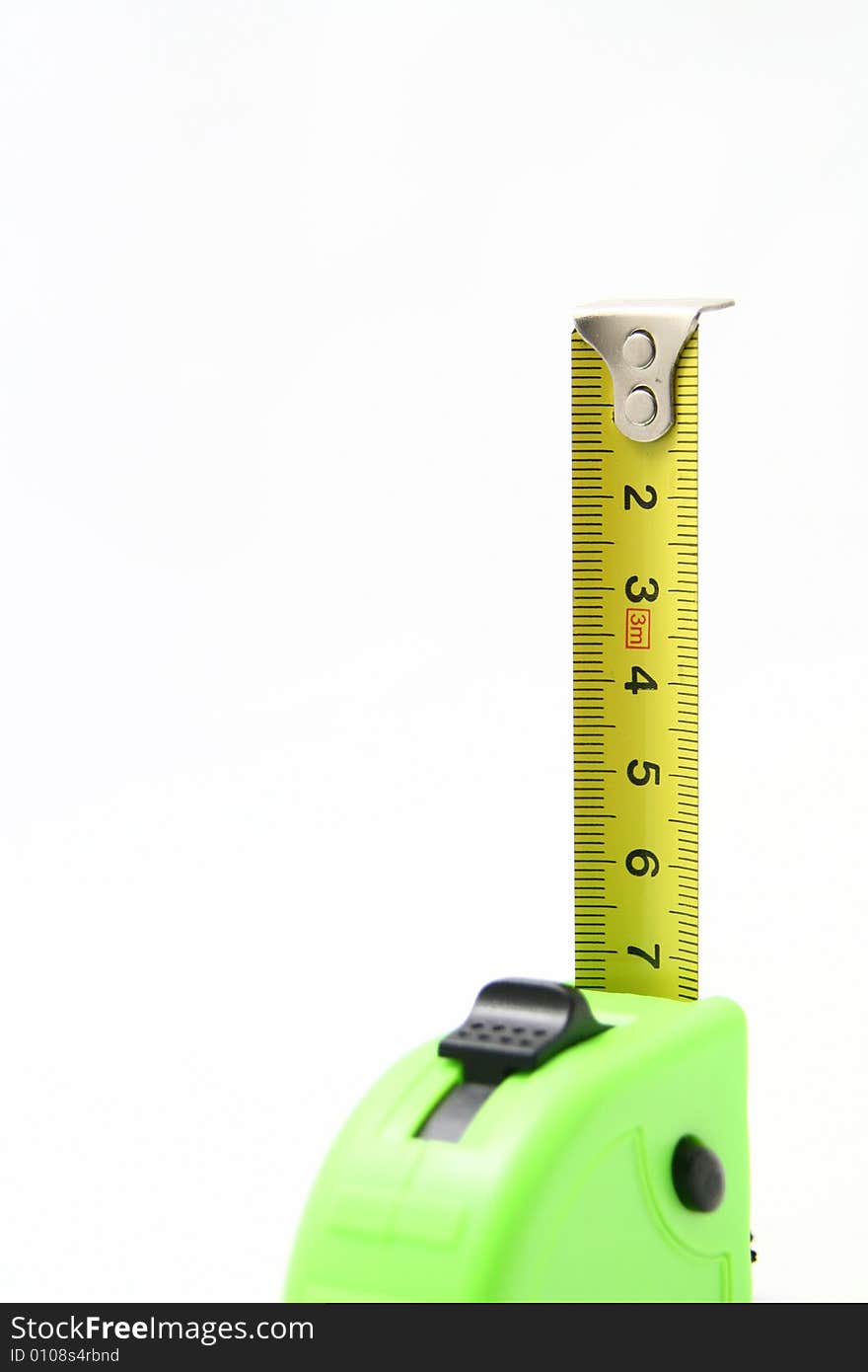 An upright measuring tape with tape partially extended.