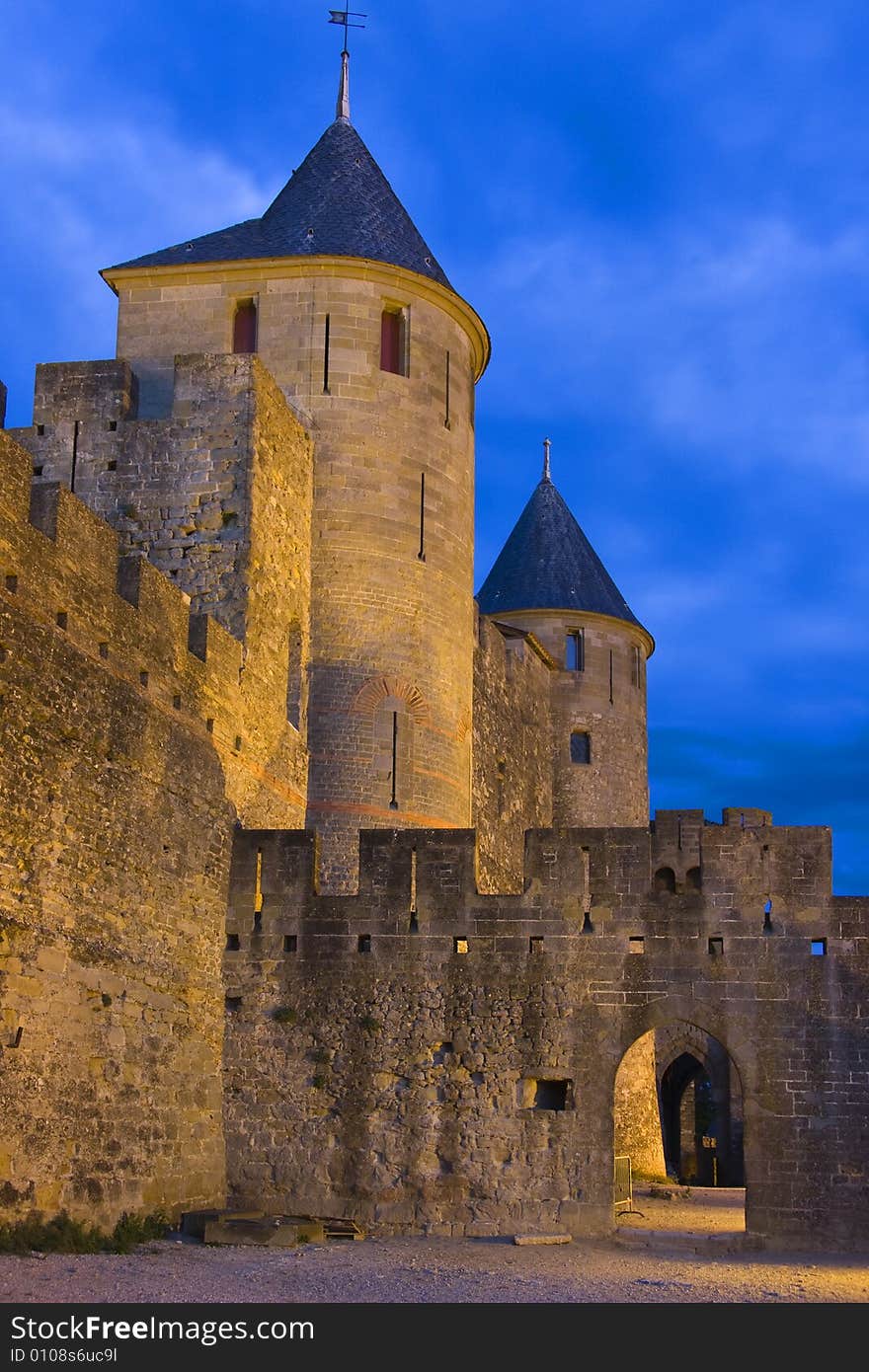 The towers of Carcassonne's medieval walls are illuminated as dusk falls. The towers of Carcassonne's medieval walls are illuminated as dusk falls.