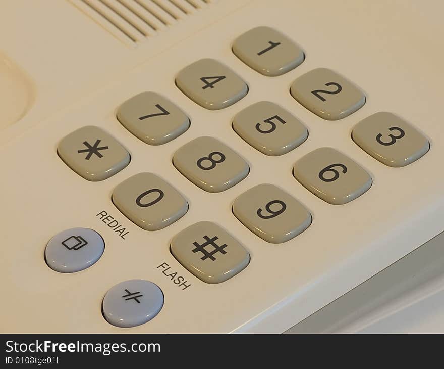 Close up buttons of gray office telephone