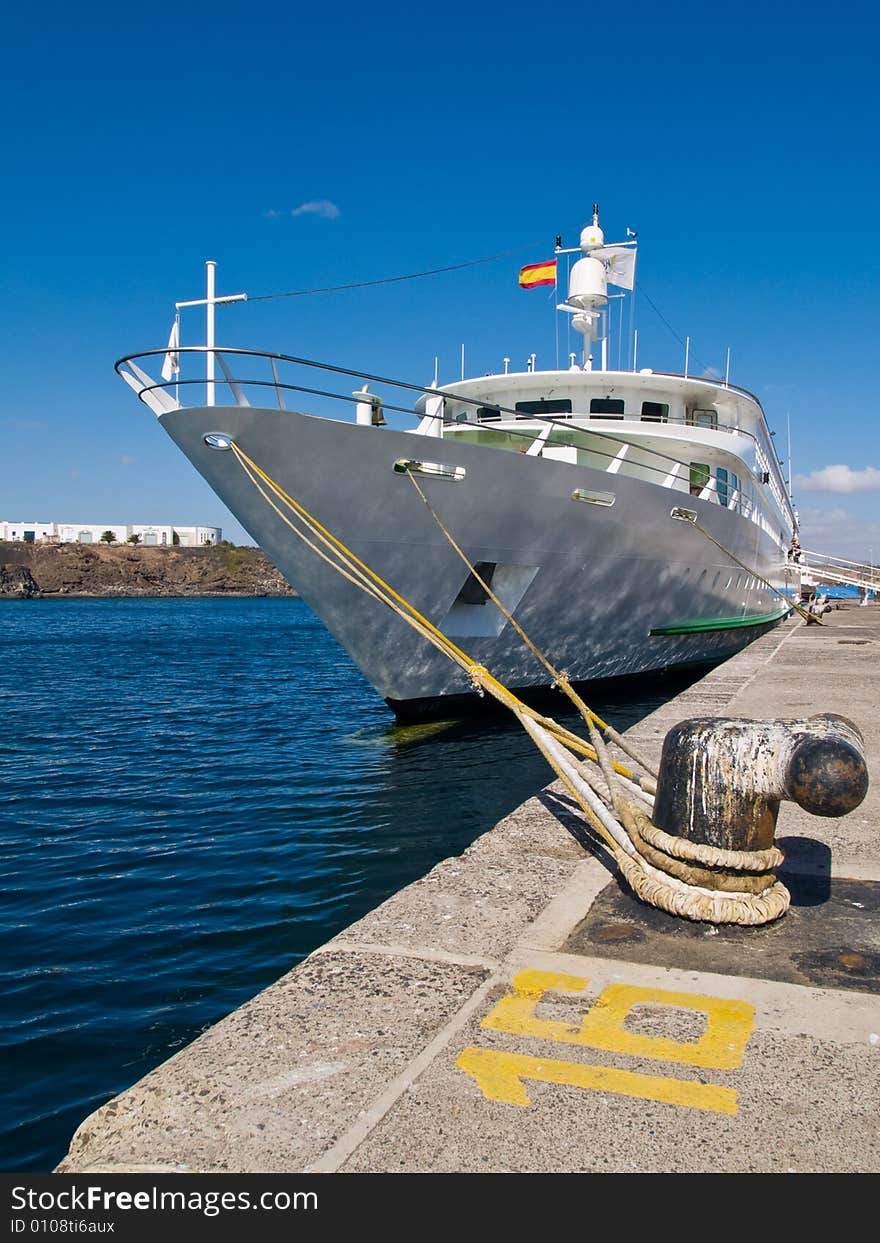 Small cruise ship near the pier