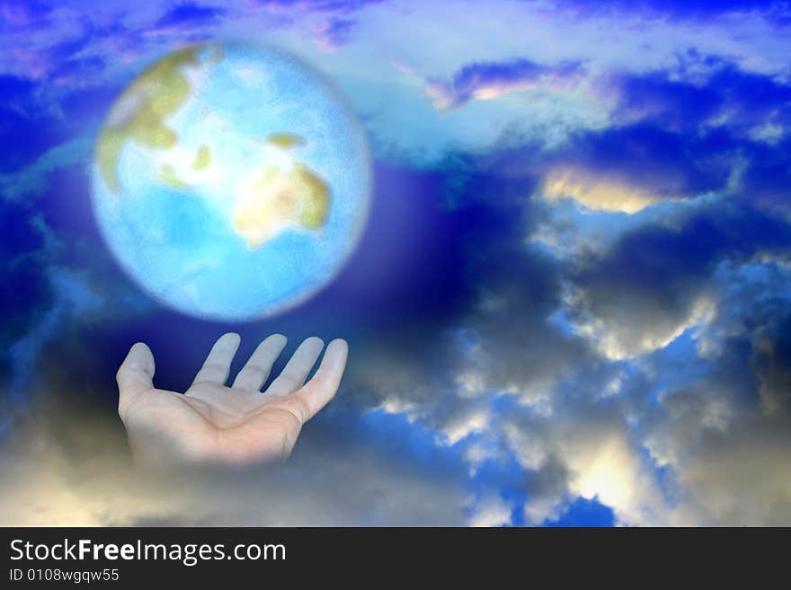 Abstract scene of the hand of the person keeps brighten planet on background cloud