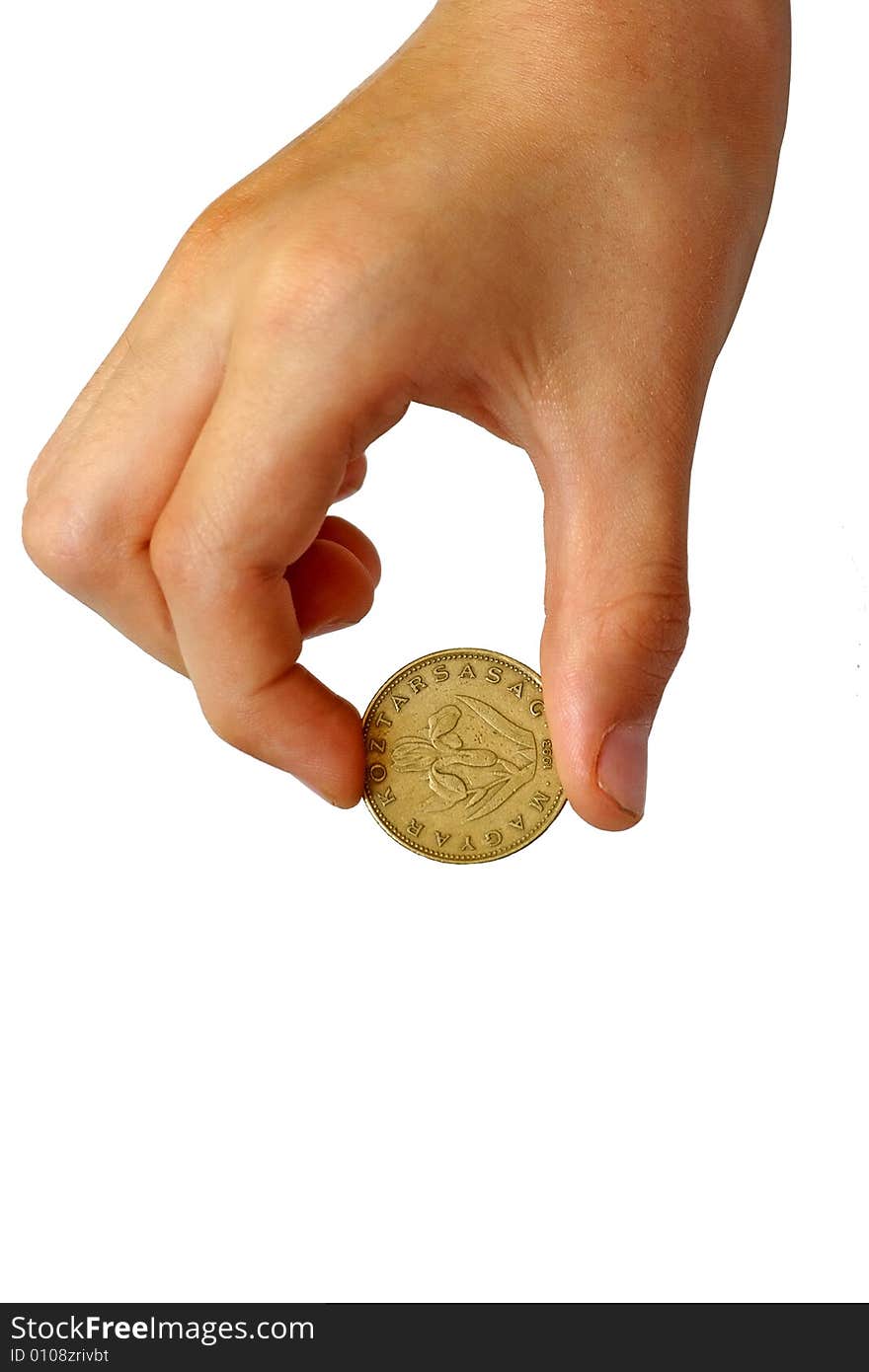 Photo of the coin in a hand on white background. Photo of the coin in a hand on white background