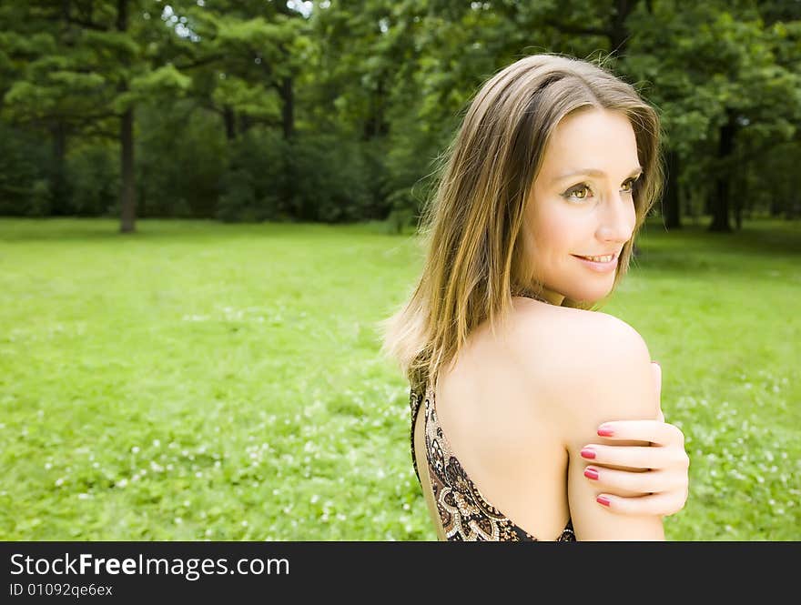 Happy Girl On The Nature Background