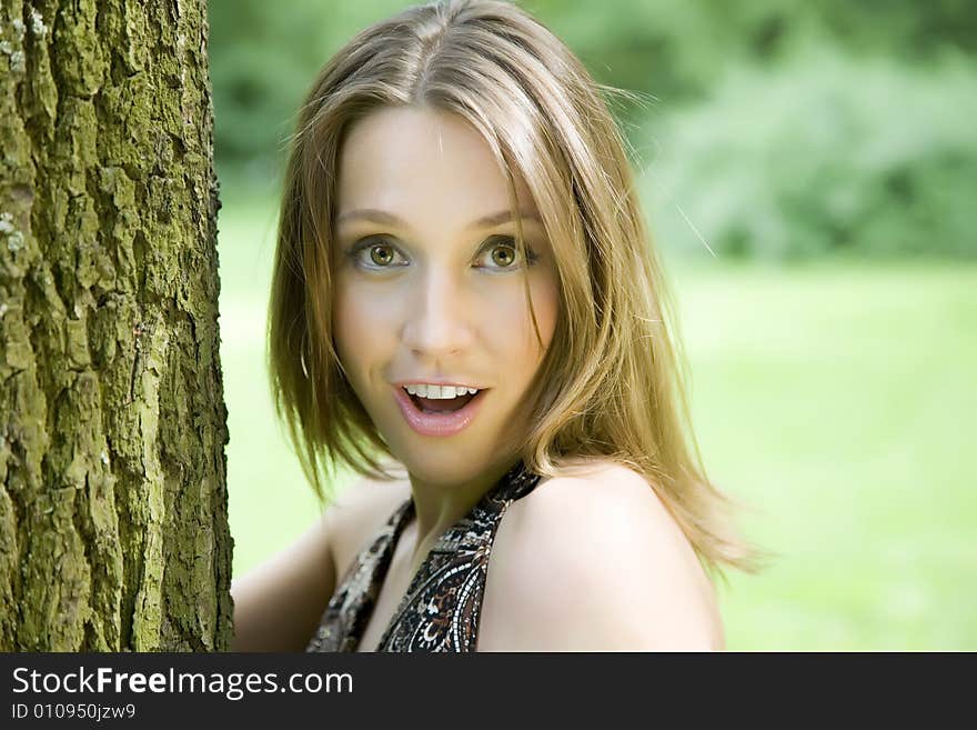 The Surprised Young Woman Outdoors