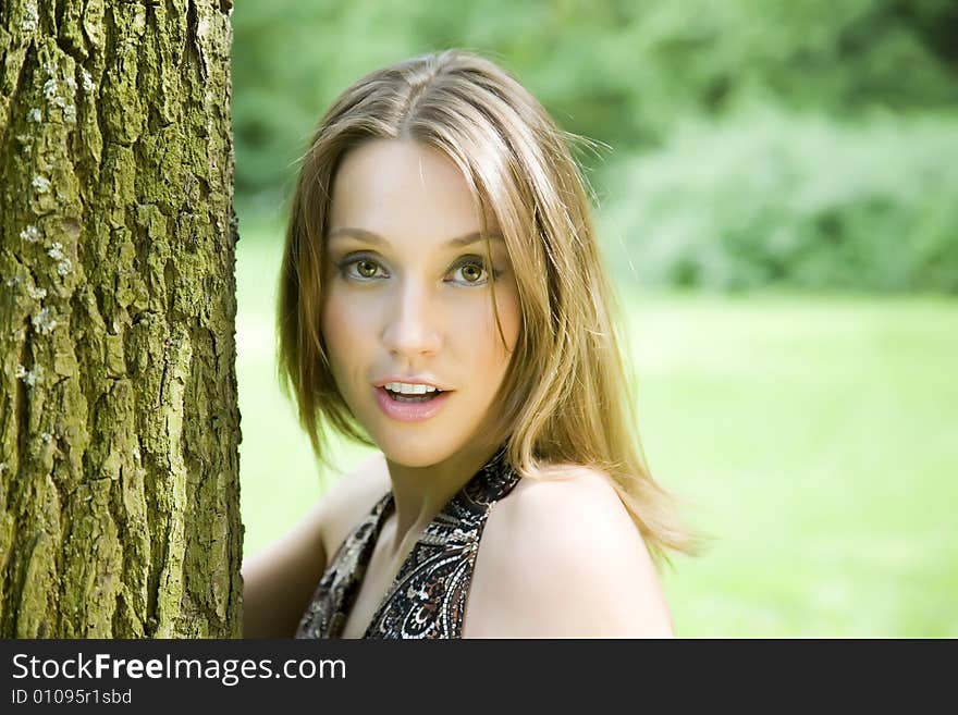 Pretty Model On The Nature Background