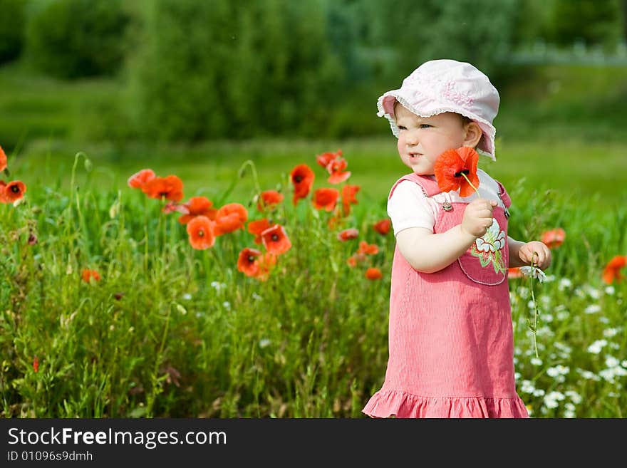 Baby-girl with poppies