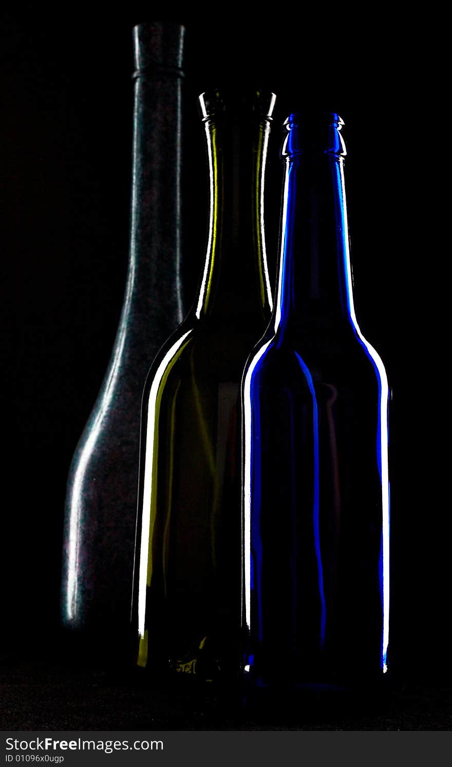 Silhouettes Of Bottles Of Wine