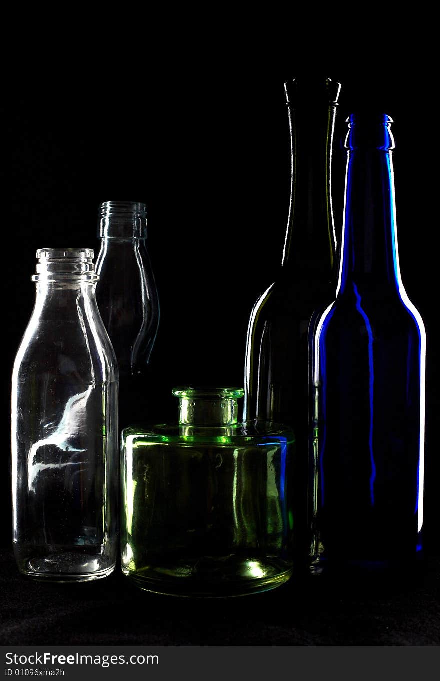 An image of silhouettes of bottles of wine