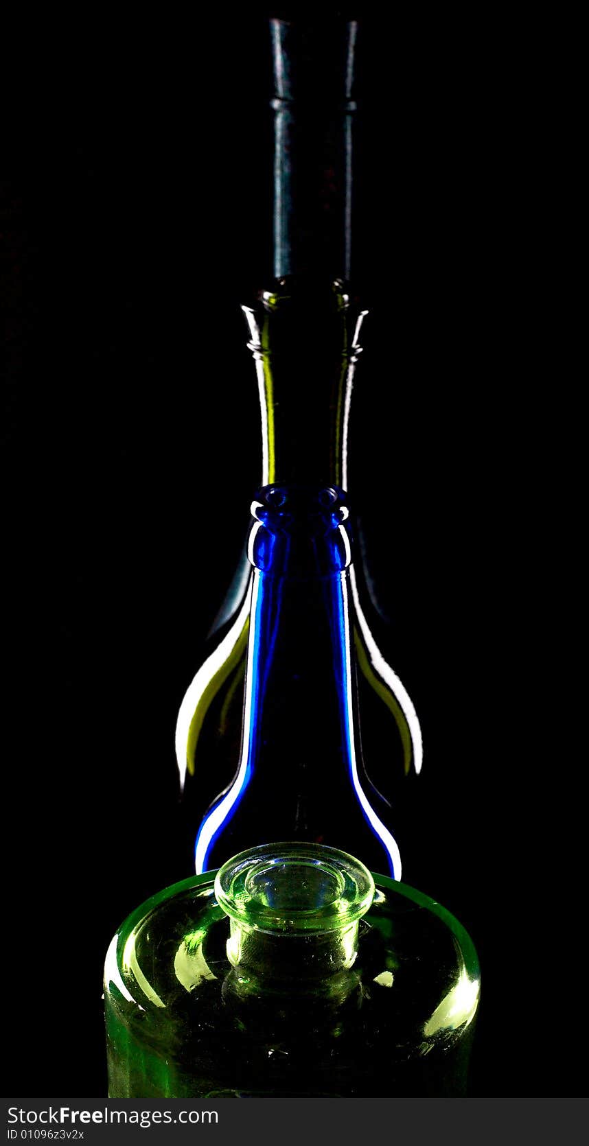 An image of bottles on black background. An image of bottles on black background