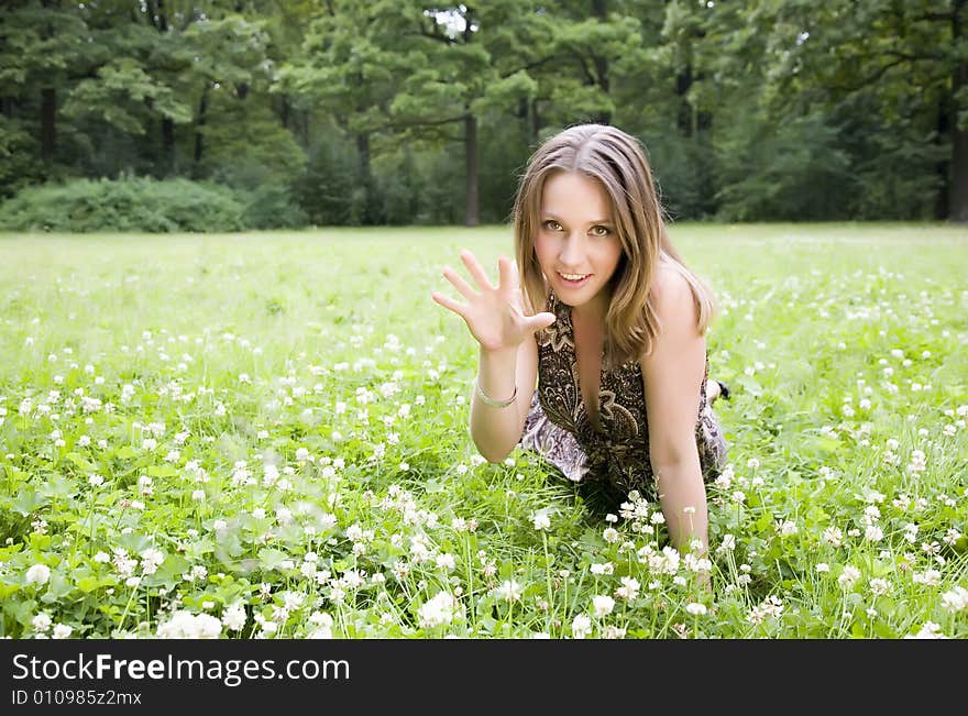 Sexy Woman On The Green Grass. Sexy Woman On The Green Grass