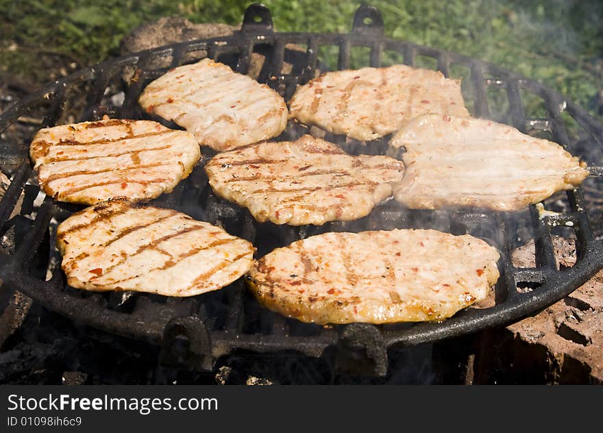 Barbecue of pork made on an outdoor grill