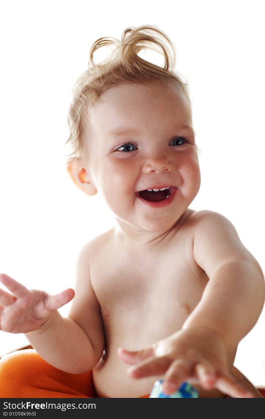 An image of smiling baby-girl. Isolated in studio. An image of smiling baby-girl. Isolated in studio.