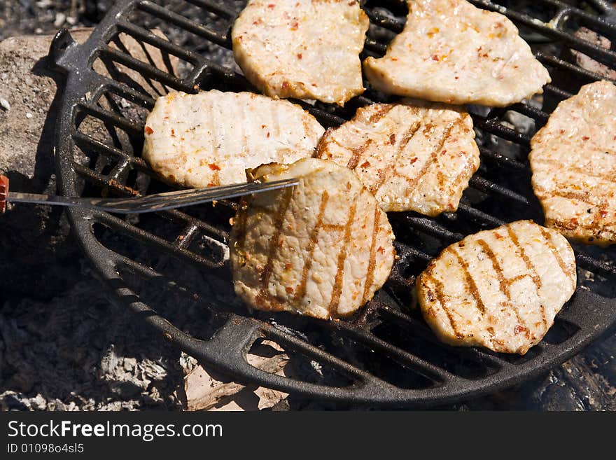 Barbecue of pork made on an outdoor grill