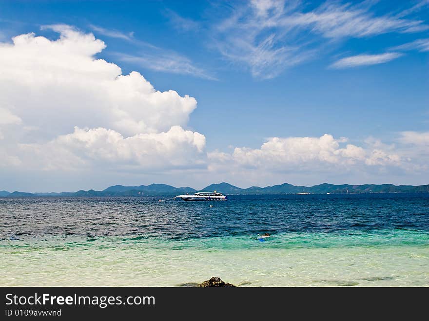 White yacht in a bay